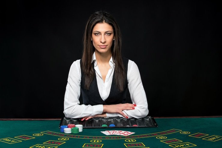Live dealer studio with multiple camera angles showing blackjack table and real dealer
